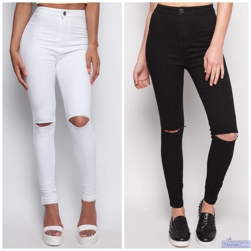 Черные и белые джинсы с дырками