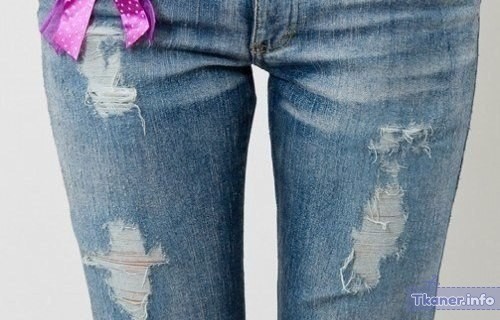 Потертости на джинсах